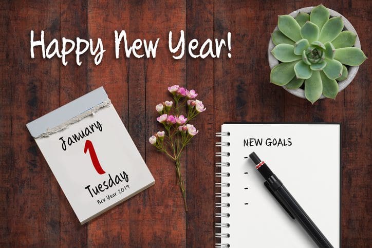 Gill Insurance |tear-off calendar with 1st of January 2019 and notebook with a checklist of "new goals"