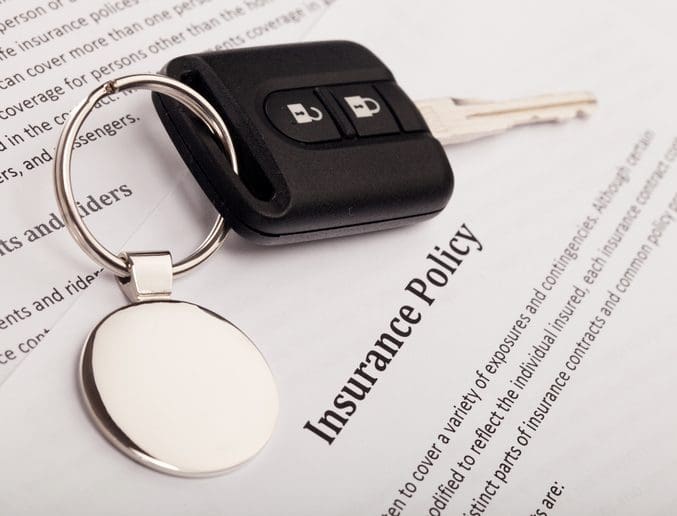 Gill Insurance | Car Key on an Insurance Policy